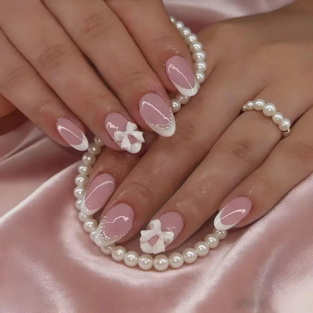 24Pcs White French Tip Press on Nails Short Almond Fake Nails with 3D Bow Pearl Design Cute Acrylic Nails Kit Glossy Nude Pink