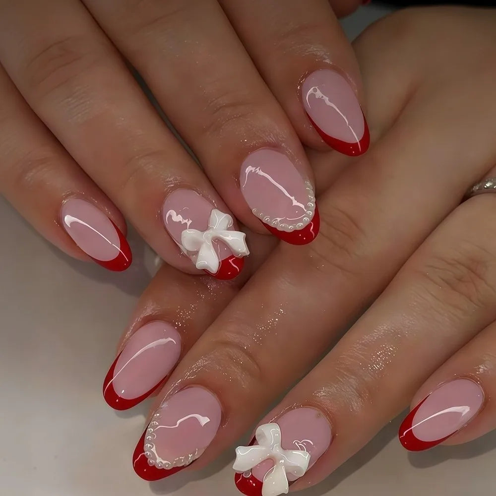 24Pcs White French Tip Press on Nails Short Almond Fake Nails with 3D Bow Pearl Design Cute Acrylic Nails Kit Glossy Nude Pink