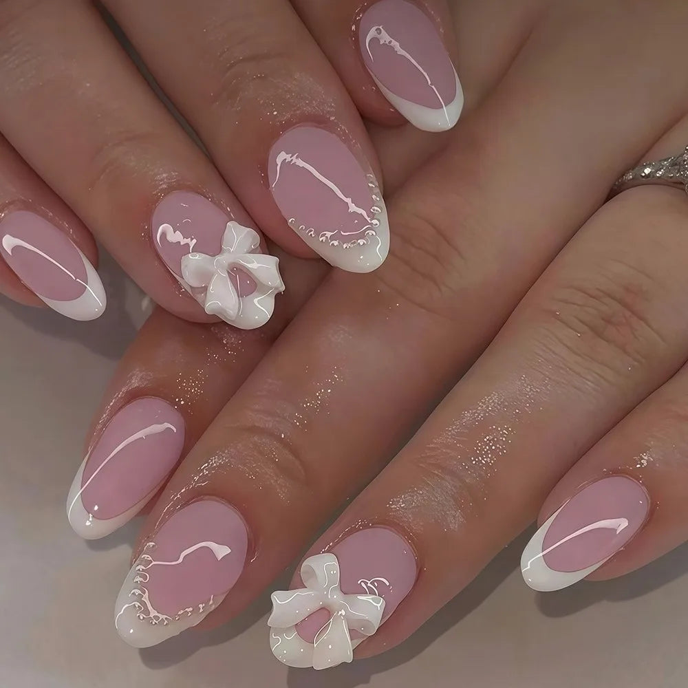 24Pcs White French Tip Press on Nails Short Almond Fake Nails with 3D Bow Pearl Design Cute Acrylic Nails Kit Glossy Nude Pink
