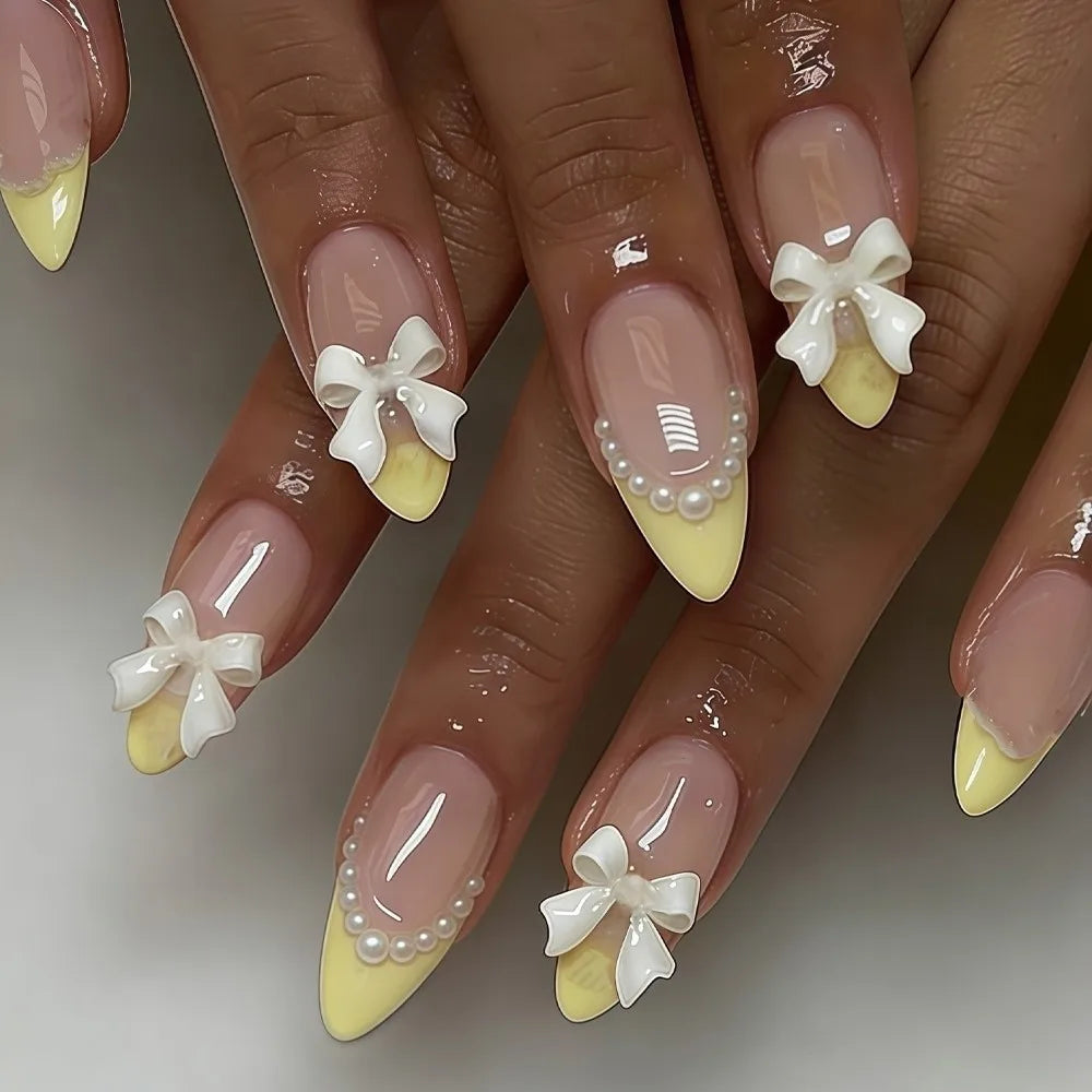24Pcs White French Tip Press on Nails Short Almond Fake Nails with 3D Bow Pearl Design Cute Acrylic Nails Kit Glossy Nude Pink
